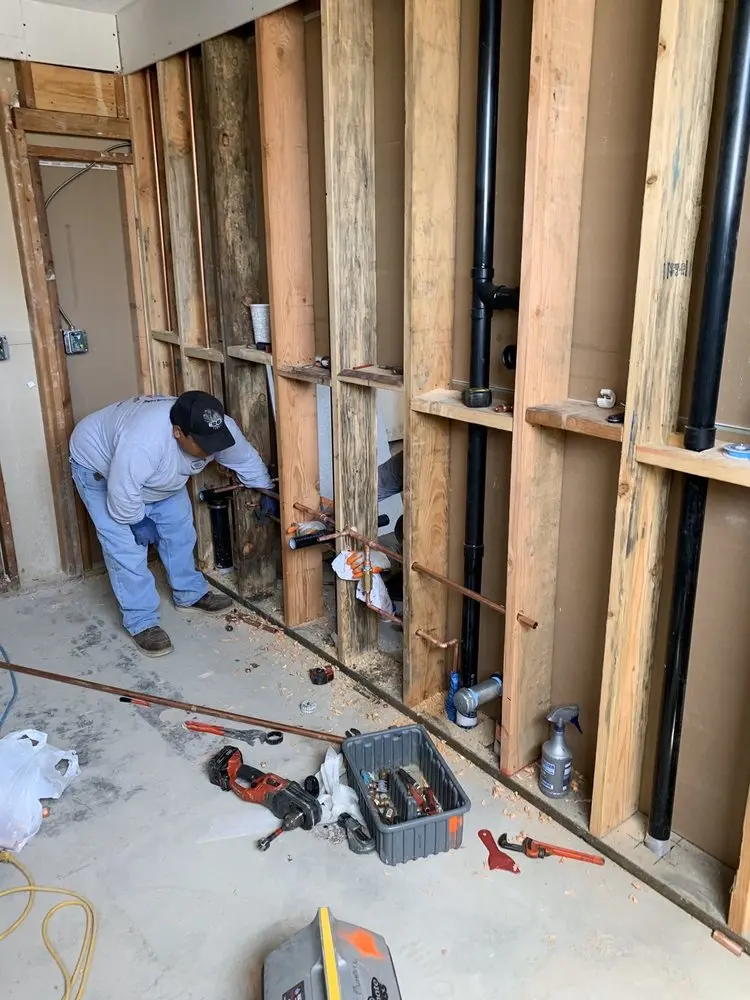 Commercial rough-in plumbing for Water Heater Replacement in Woodhaven